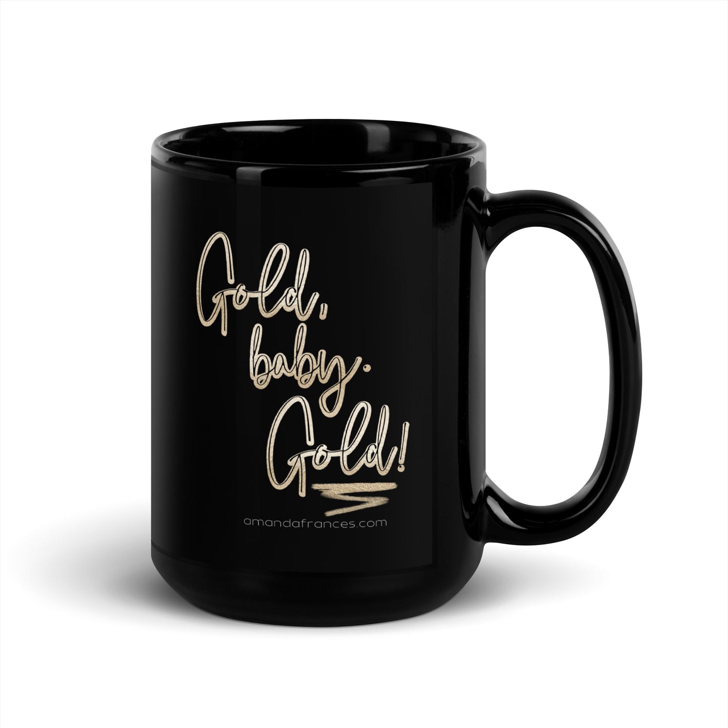 Glossy black coffee mug printed with the text: Gold, baby. Gold! in gold script lettering
