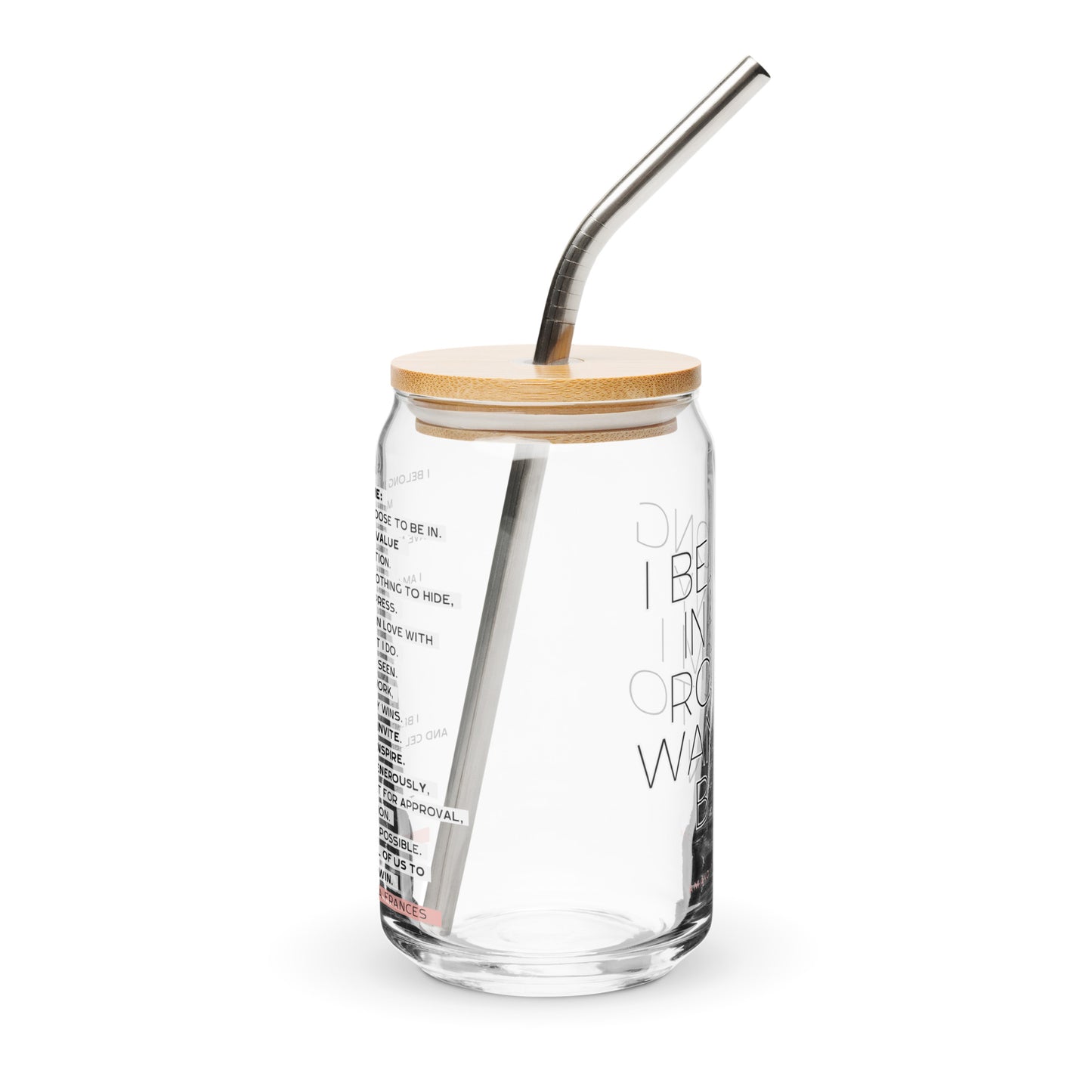 Glass tumbler with straw and wooden lid on a white background. The text says: I belong in any room I want to be in.