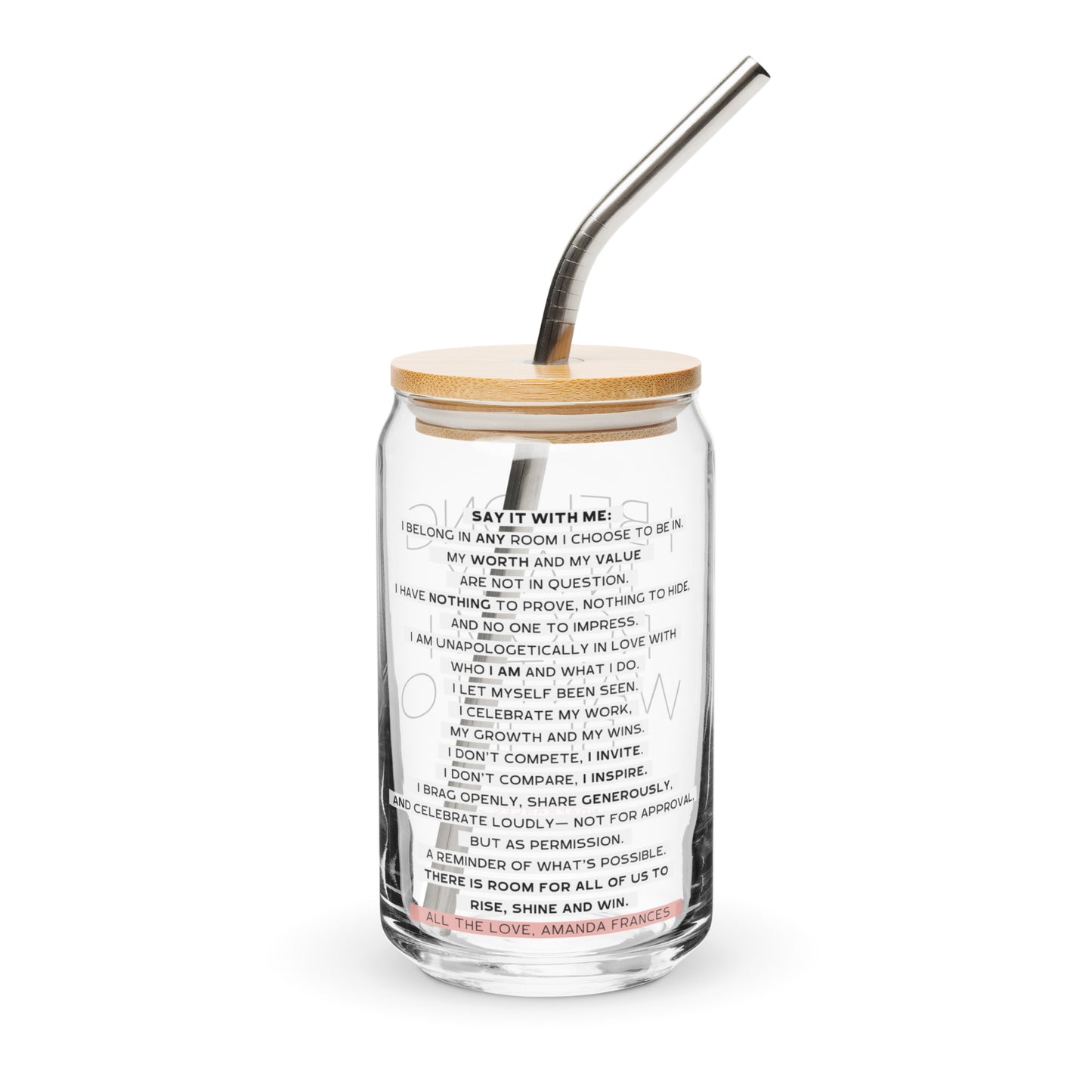 Glass tumbler with straw and wooden lid on a white background. The text says: I belong in any room I want to be in.