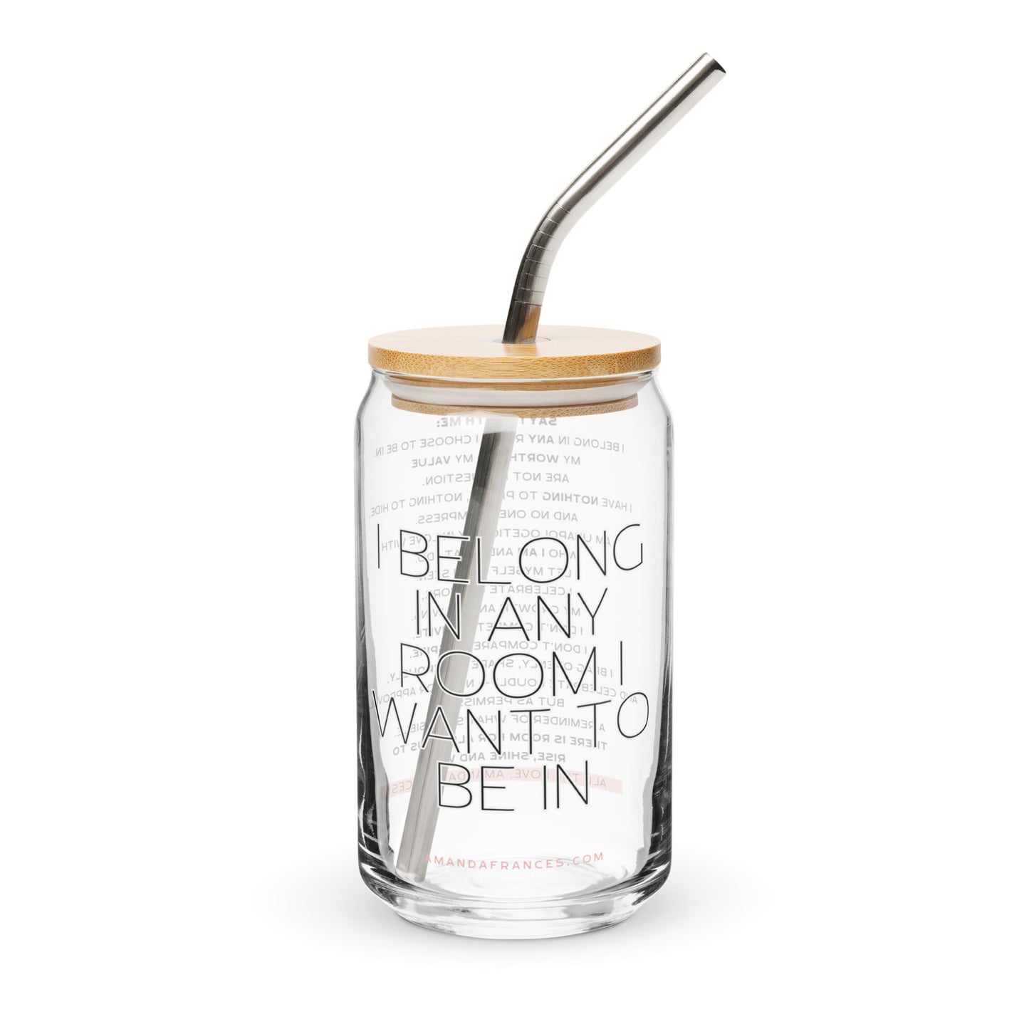 Glass tumbler with straw and wooden lid on a white background. The text says: I belong in any room I want to be in.