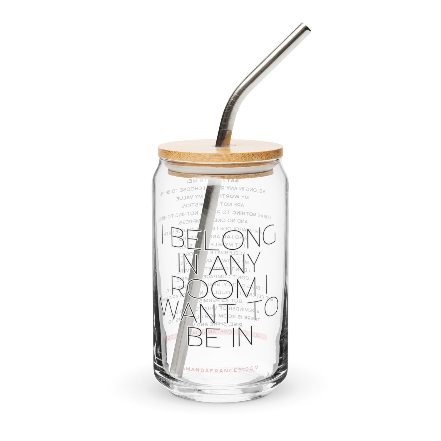 Glass tumbler with straw and wooden lid on a white background. The text says: I belong in any room I want to be in.